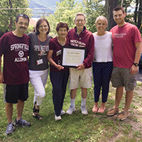 Peter Price, Ellen Reidy, Peg Price, Walter V. Price, President Mary-Beth Cooper, and Jonathan Reidy