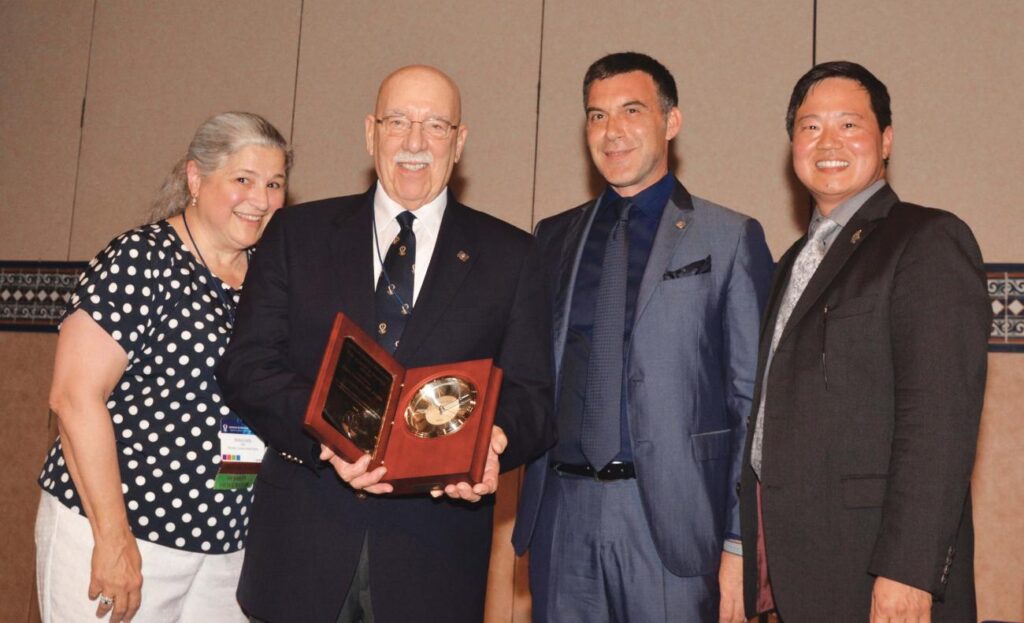 1960 Paul Cianci accepts the Albert R. Behnke Award.