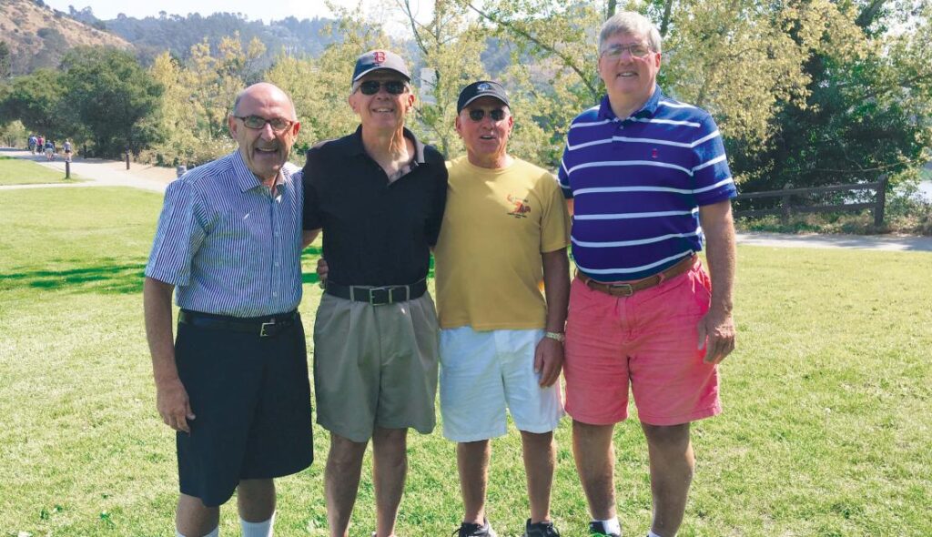 Four former football teammates including Nick Papas '73, Chris Petty '73, Bill Libardoni '73, and Billy Rice '73, G'78, reunited at the wedding of Papas' son last September.