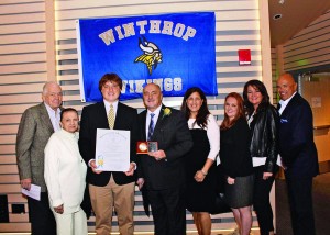 1978 John Lyons (center) is joined by, from left, parents Lloyd and Pauline Lyons, son Christian Lyons, wife Peg Lyons, daughter Tiffany Shliapa, friend Beth McGinnis, and brother Peter Lyons for his induction into the Winthrop, Mass., Athletic Hall of Fame.