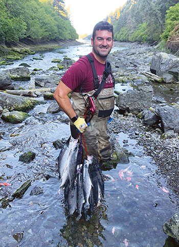 Dan Warren '06 catching salmon in Alaska