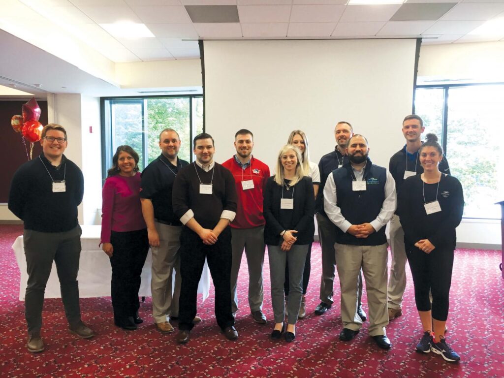 Alumni on campus for a career networking event included, from left, Logan Mullen, Erin Friedman, Kyle Abad, Matt DiBona, Drew Supernor, Andrea Butler, Jordyn Moquin, Greg Leonard, Josh Urrutia, Pete Baranski, and Danielle Kireyczyk