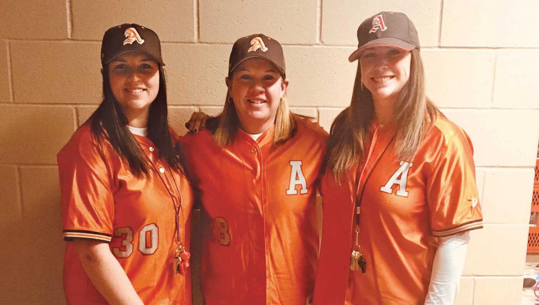 Katelyn Maggio ’13, G’15, Physical/Health Education Teacher, Agawam High School (Pictured with the school’s physical education staff, including Kathy Georgina ’96, G’98, in middle, during Spirit Week Twin Day)