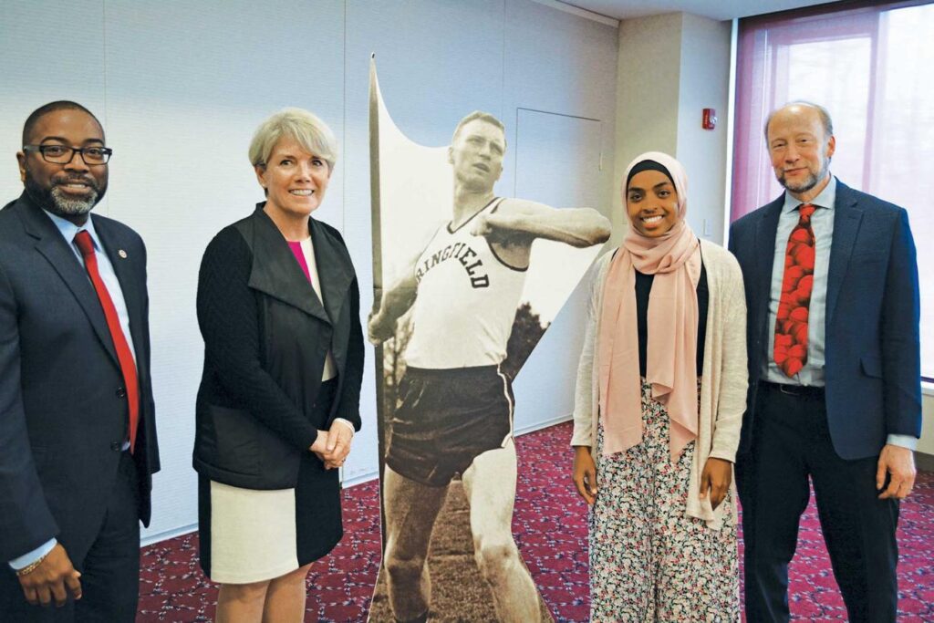 Vice President for Inclusion and Community Engagement Calvin Hill, from left, President Mary-Beth Cooper, speaker Bilqis Abdul-Qaadir, and Professor Marty Dobrow