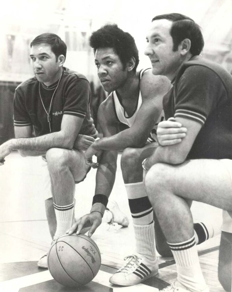 Captain Steve Waterman with head coach Ed Bilik, right, and assistant coach Ray Gilbert