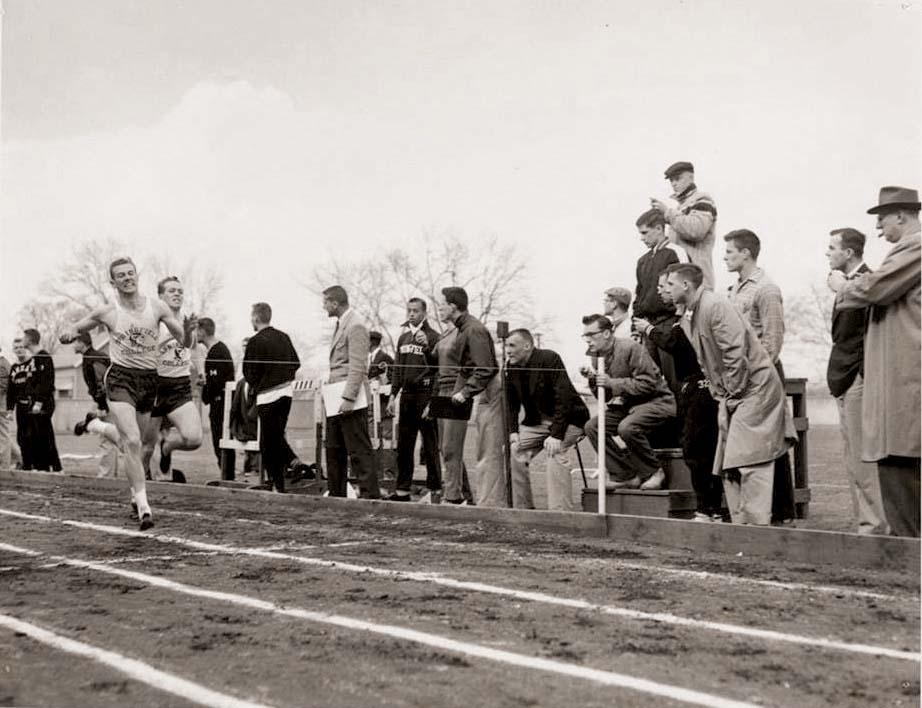 Jim White breaking the tape in the 440 vs. Amherst College in 1956