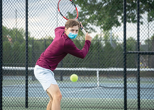 male tennis player practicing