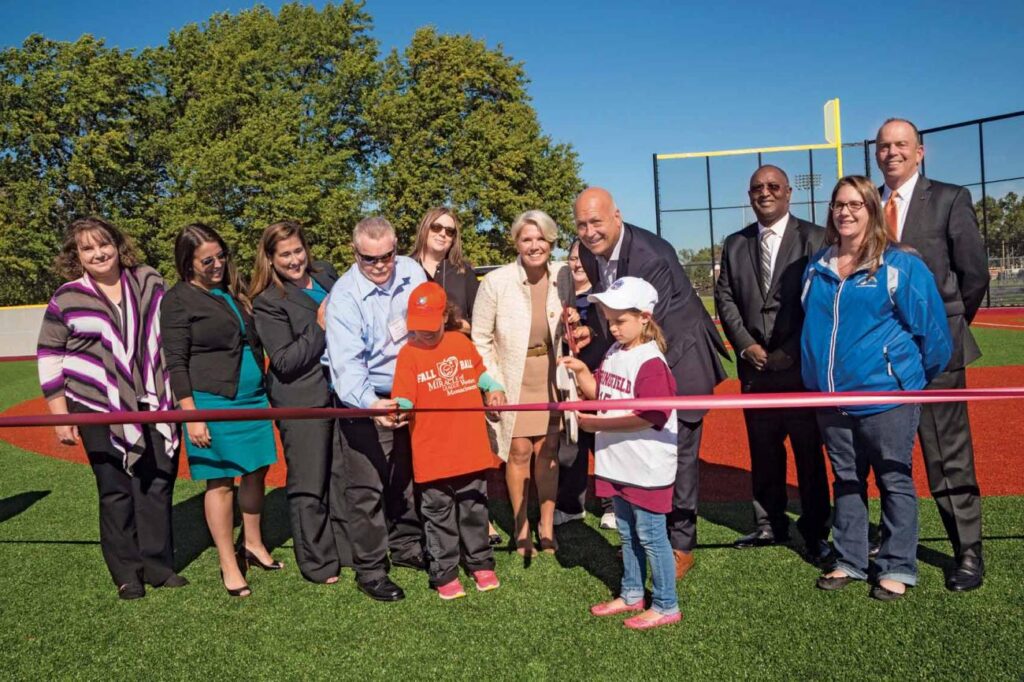 President Mary-Beth Cooper and Cal Ripken dedicate the College ability field.