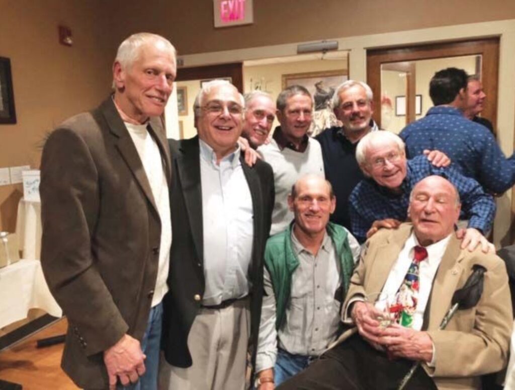 Top row from left,  Marty Butler '68, Tom Fontecchio '69, Dick Siebert '72, David Ellis '70, and Steve Posner ; in the bottom row, from left, are Kent Anderson '61, Peter Bacon '65, and Joe Schuhwerk '61. Joe's wife, Linda Ruppersberger Schuhwerk, G'62, is missing from the photo. 