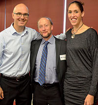 Sports journalism associate professor Marty Dobrow, center, with Steve Rushin and Rebecca Lobo