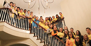 LTC students pose with President Cooper as they celebrate Giving Tuesday efforts on the campus.