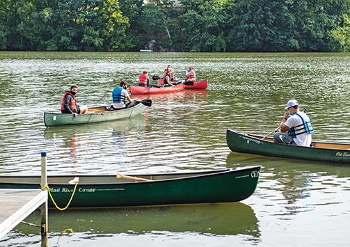 The President’s Residence dock provides additional space and access to Lake Massasoit for physical education activity class students and faculty to canoe