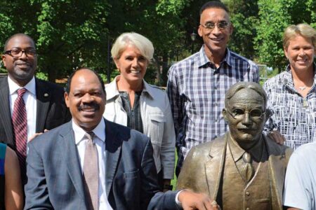 Rebecca Lobo, from left, Vice President for Inclusion and Community Engagement Calvin Hill, Artis Gilmore, President Mary-Beth Cooper, Mannie Jackson, Ann Meyers, and Spencer Haywood take a moment from the second annual Education and Leadership Luncheon, hosted in partnership with the Naismith Memorial Basketball Hall of Fame on the campus in September, to pose with a statue of basketball’s inventor, James Naismith. Lobo and Jackson, members of the Hall’s 2017 Class, are joined by Hall of Famers Gilmore, Meyers, and Haywood.