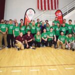 More than 30 student volunteers assist with the Special Olympics volleyball tournament on the campus.